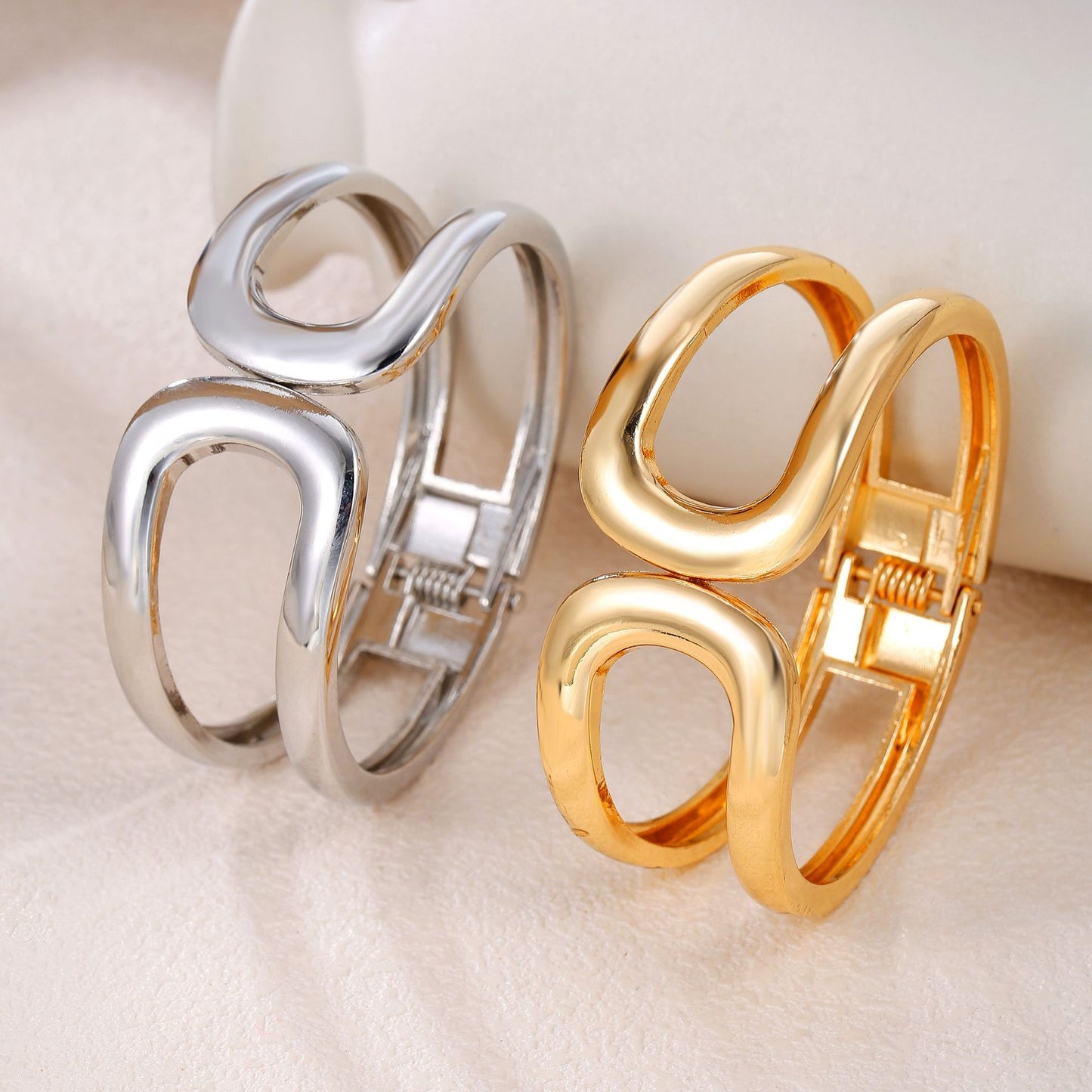 Minimalist Cool-Tone Alloy Bracelet with Hollow Double Circular Arc Design Spring-Opening Bangle for Women