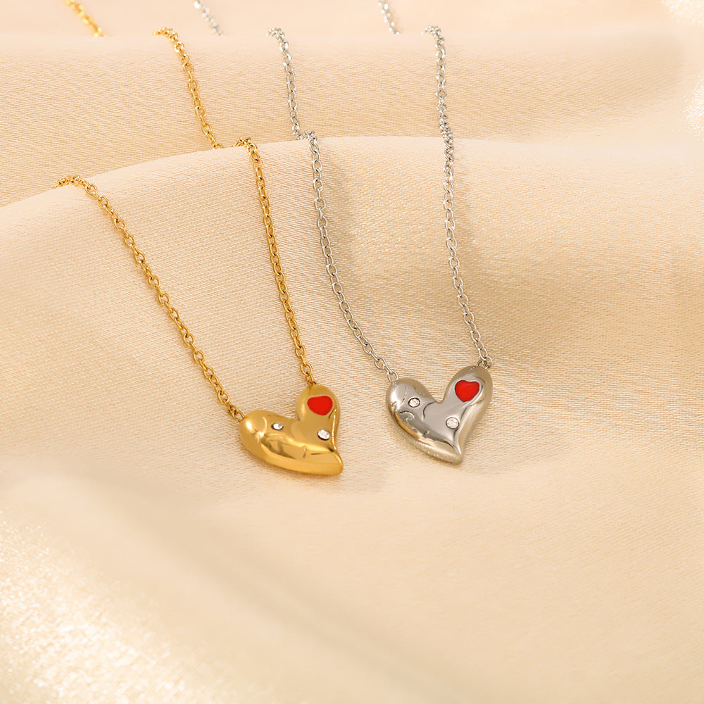 Collana asimmetrica minimalista a forma di cuore da donna in acciaio al titanio con intarsio di strass e placcatura sottovuoto in oro 18 carati