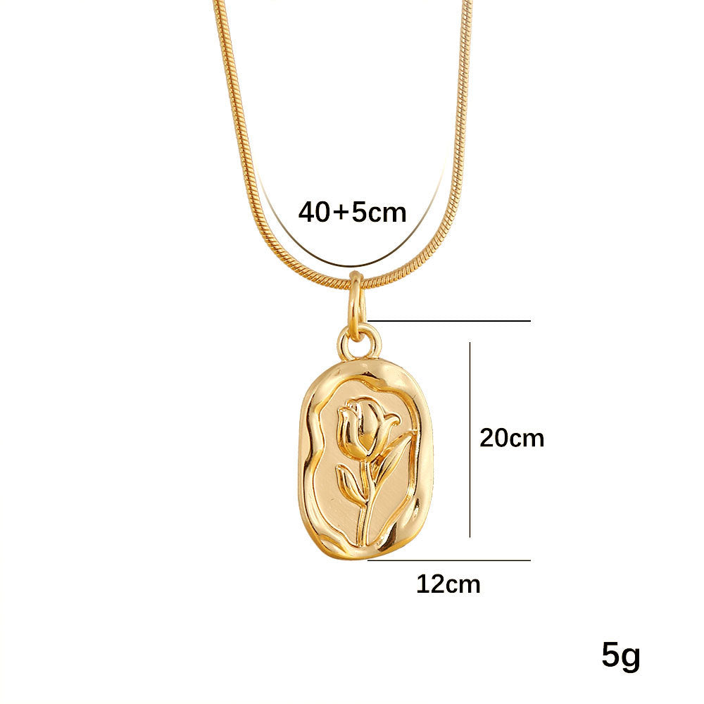 Collana pendente vintage a tulipano e rosa francesi in acciaio al titanio con placcatura in oro 18 carati su catena a serpente