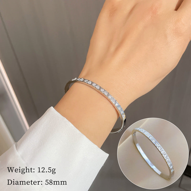 Bracciale minimalista in acciaio al titanio, stile etnico cinese vintage, con strass rotondi