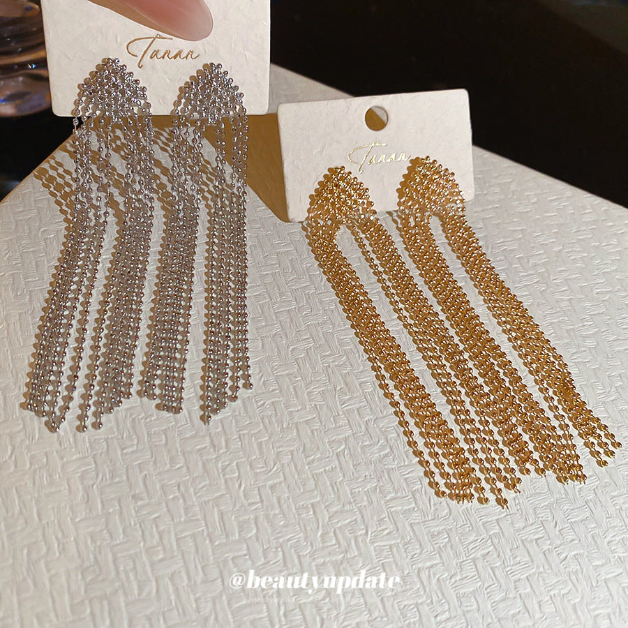 Pendientes colgantes geométricos de rombo en metal chapado con postes de acero para mujer
