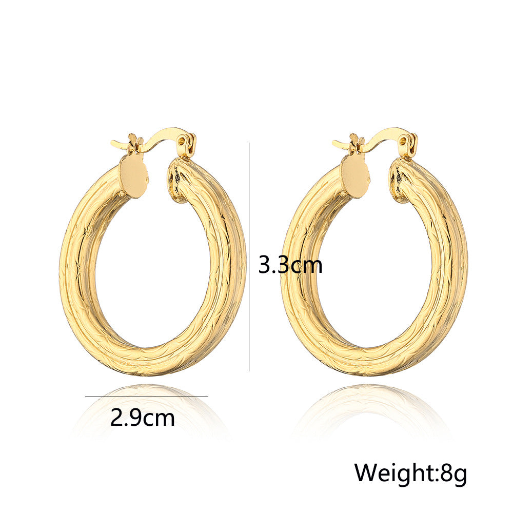 Aretes Redondos Geométricos en Cobre con Baño de Oro de 18K y Incrustación de Zircón para Mujer