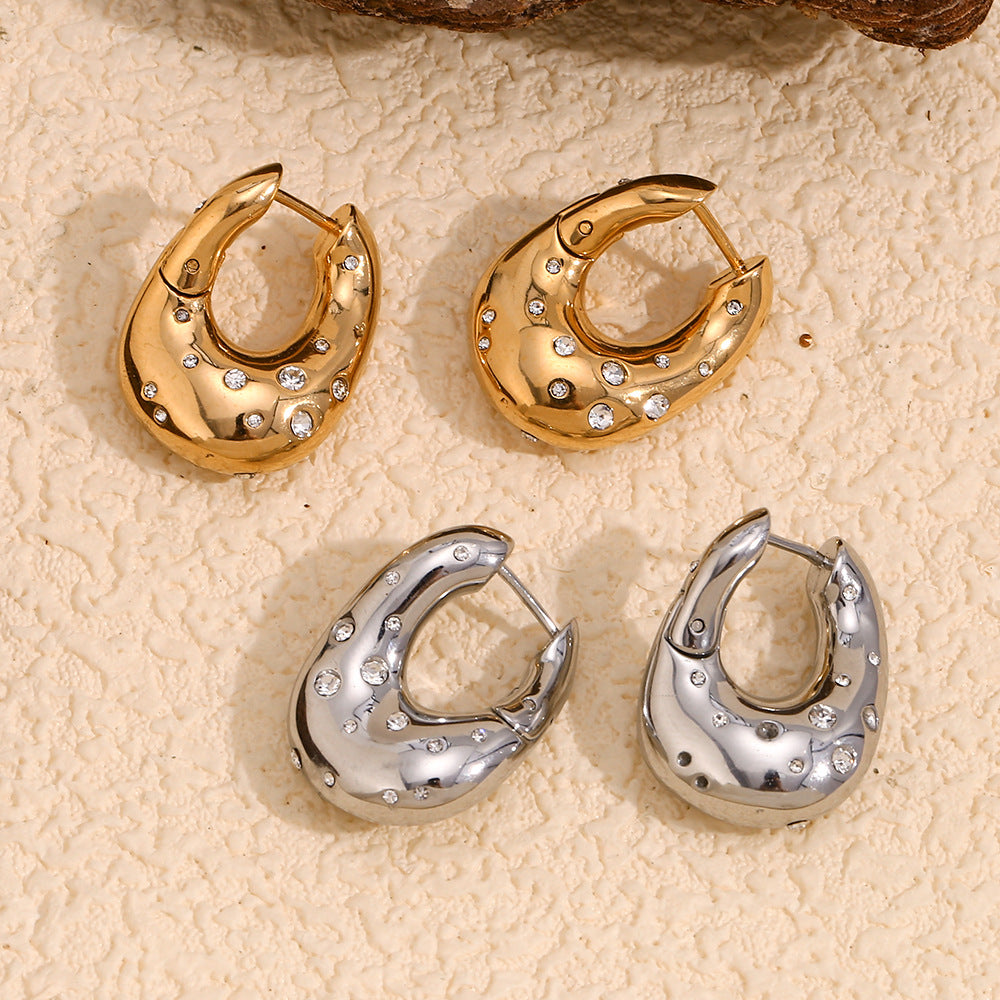 Orecchini a perno geometrici alla moda in acciaio inossidabile con placcatura in oro 18K e design a stella irregolare attorcigliata da donna