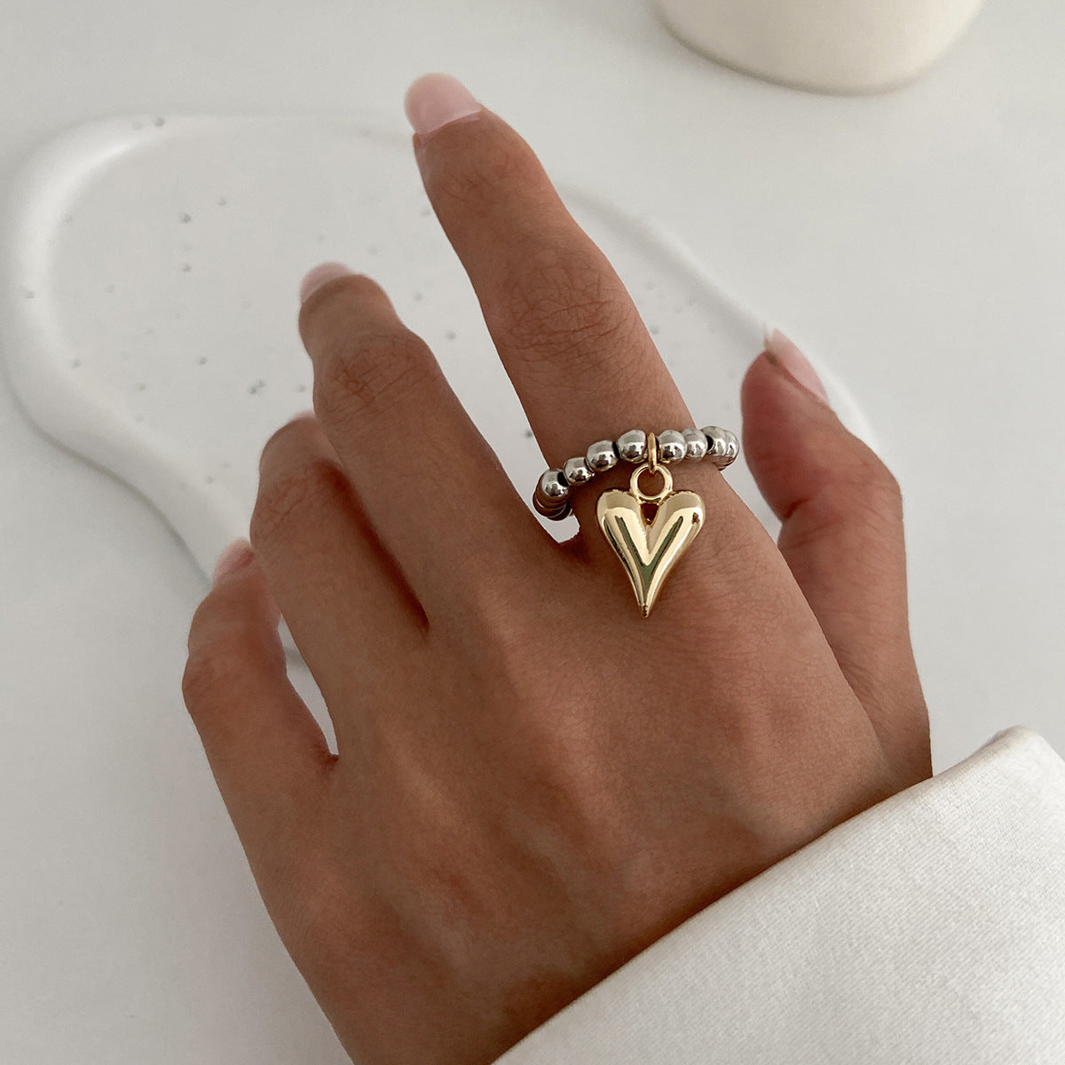 Bracciale da donna con perline a forma di cuore geometrico individualistico e nappine