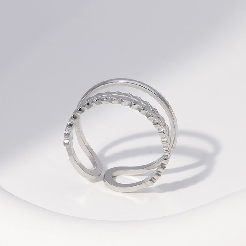 Anello aperto in acciaio inossidabile a forma di foglia minimalista da donna con finitura placcata