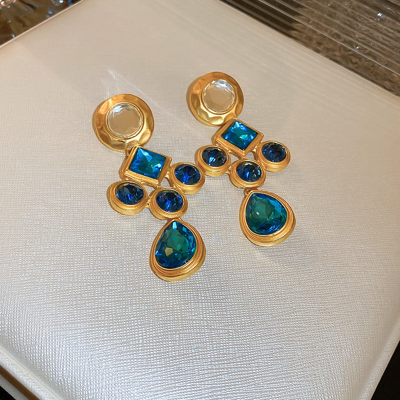 Orecchini vintage chic floreali e geometrici traforati da donna con base in rame placcato oro e perni in acciaio inossidabile