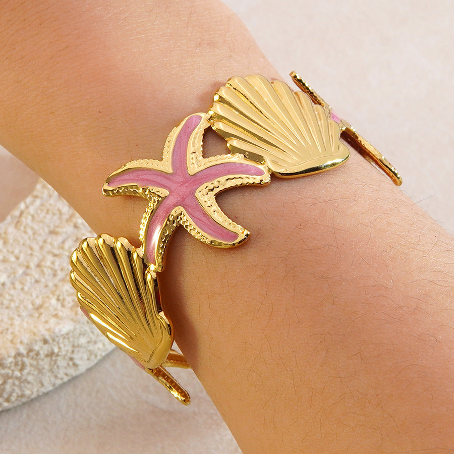 Bracciale a polsino in acciaio inossidabile con gocciolamento casuale, stella marina e conchiglia