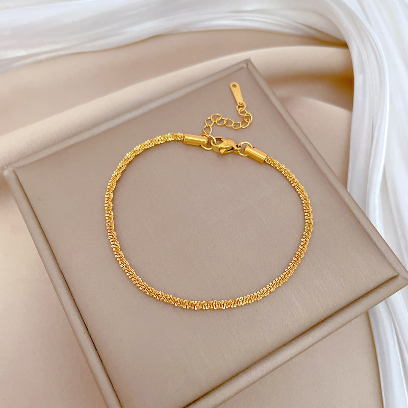 Minimalist Titanium Steel Chain Bracelet for Women with Zodiac Charm, Gold-Plated Finish, Water Wave and Four-Leaf Clover Pattern, Ideal for Birthday Gift or Travel Souvenir