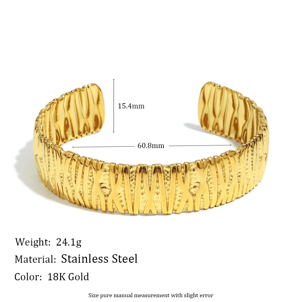 Pulsera de acero inoxidable para mujer de inspiración vintage con diseño vertical irregular ondulado y acabado chapado en oro de 18 quilates