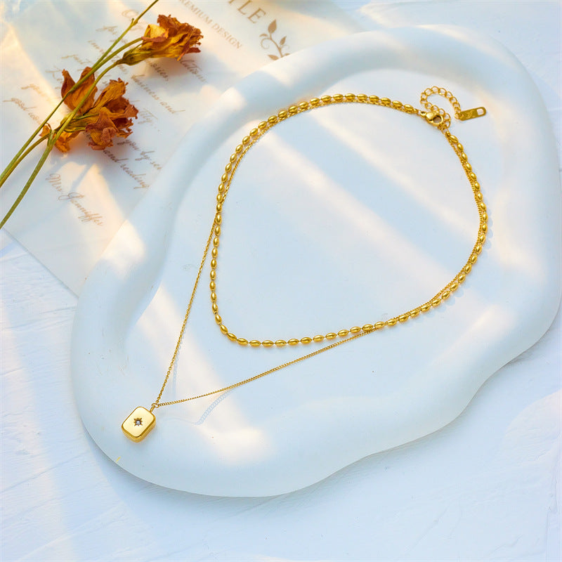Collar con colgante octagrama geométrico retro minimalista de acero de titanio con incrustaciones de diamantes de imitación en cadena de serpiente para mujer