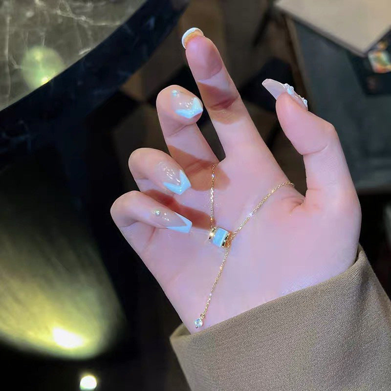 Collana con pendente in acciaio al titanio geometrico stile naturale con pietra occhio di gatto e nappa per donna