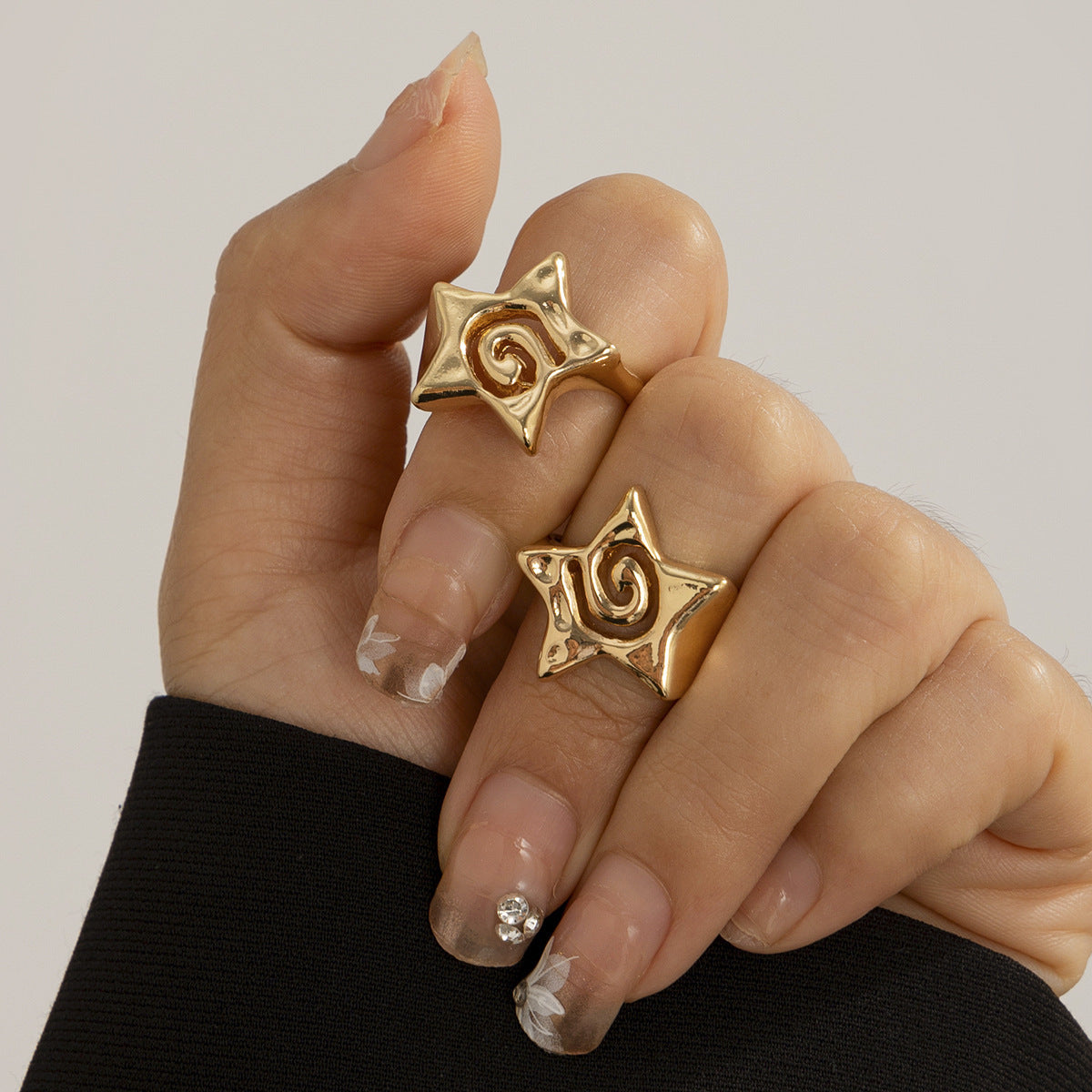 Set di anelli da donna in lega a forma di stella geometrica minimalista con finitura placcata