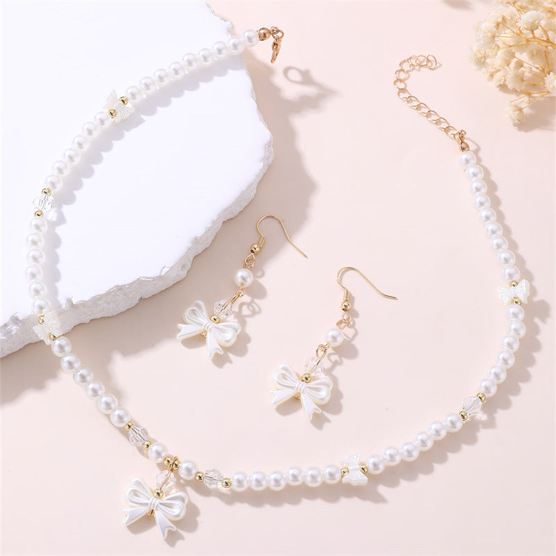 Set di Collana Minimalista per Bambine a Forma di Fiocco e Cuore in Resina con Finitura Placcata, per Età 3-10 Anni