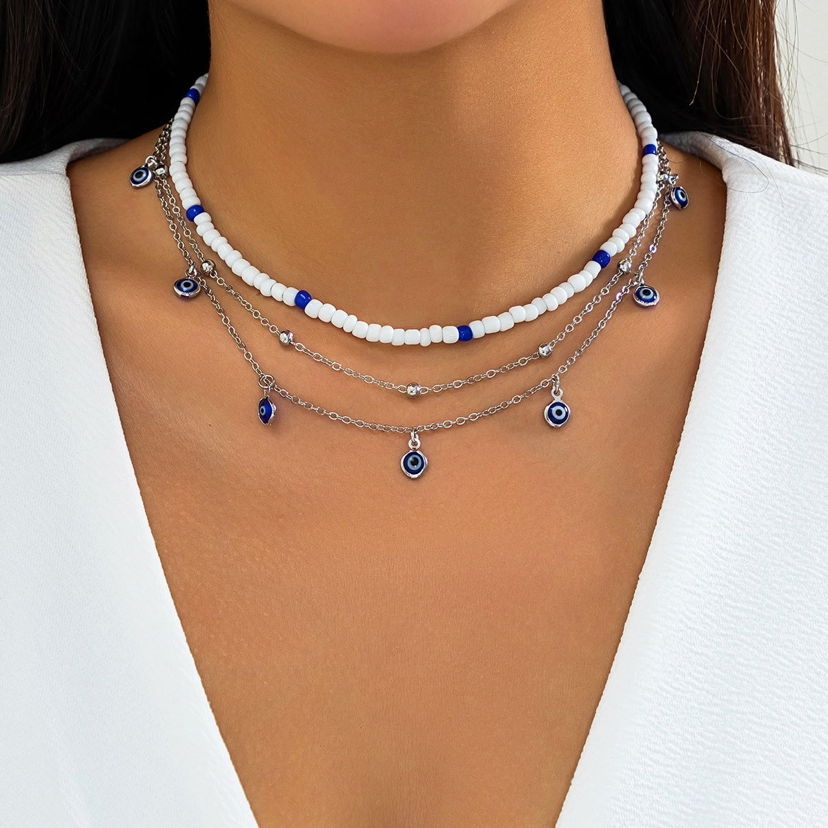 Collana a clavicola con ciondolo a occhio in perline vintage da donna con perline in resina, forma geometrica e nappe