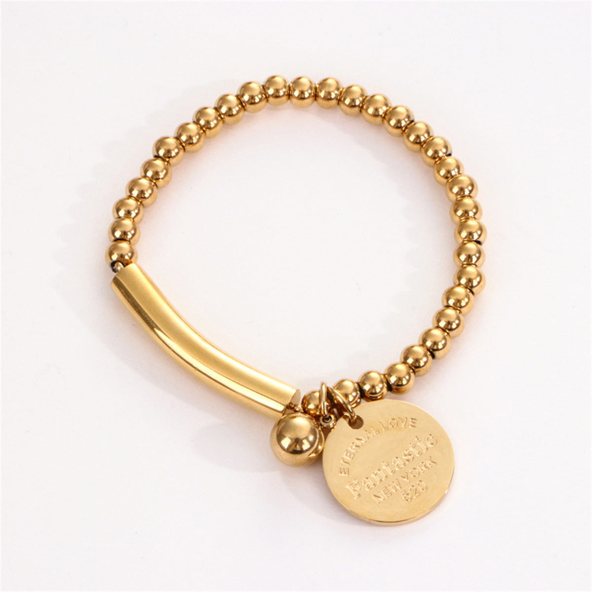 Bracciale da donna in acciaio inossidabile con disco tondo minimalista, perline elastiche e finitura lucida