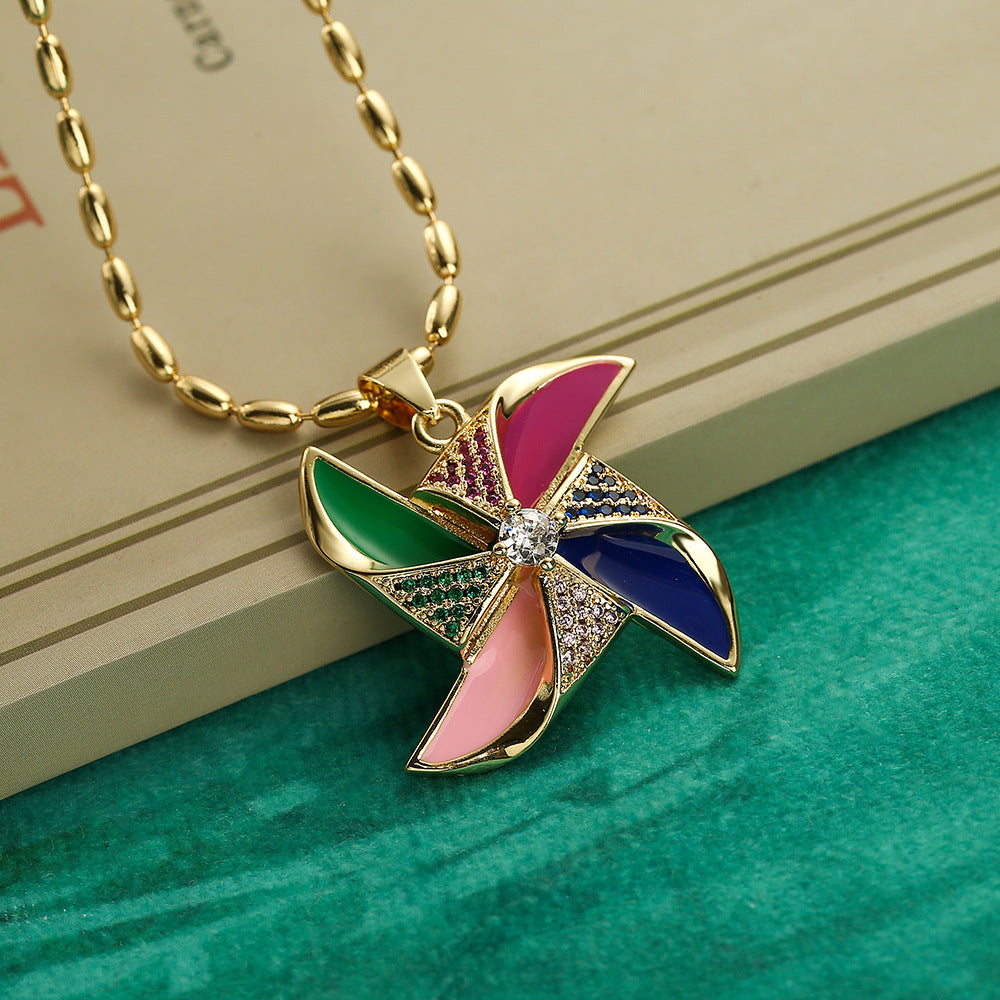 Collana con pendente a forma di fiore di mulino a vento geometrico irregolare minimalista da donna in rame con accenti di strass
