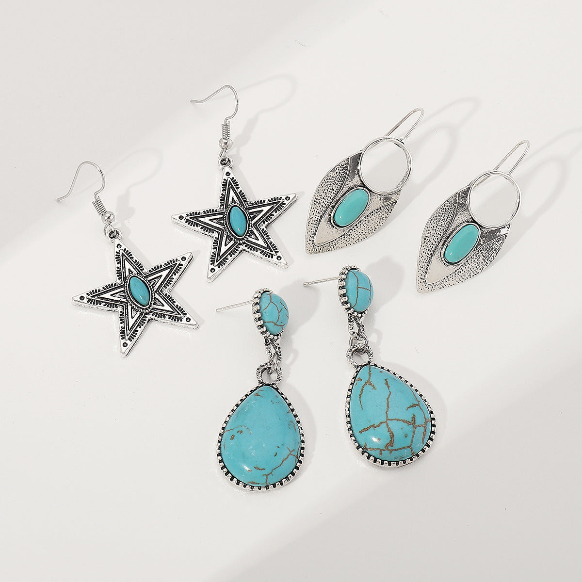 Pendientes étnicos de aleación con forma de estrella geométrica con incrustaciones de turquesa, diseño artístico vintage para mujer