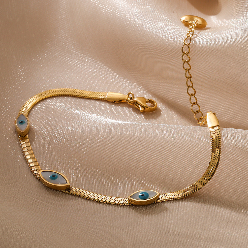 Bracciale minimalista a occhio di Allah in acciaio al titanio con pavé per donna