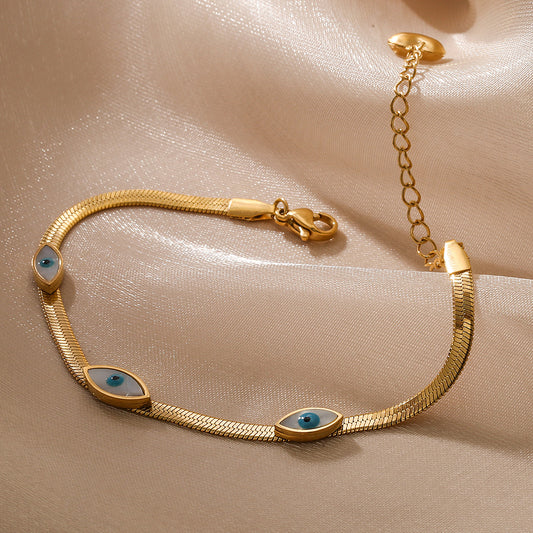 Pulsera de titanio y acero con ojo turco geométrico minimalista y microengaste para mujer