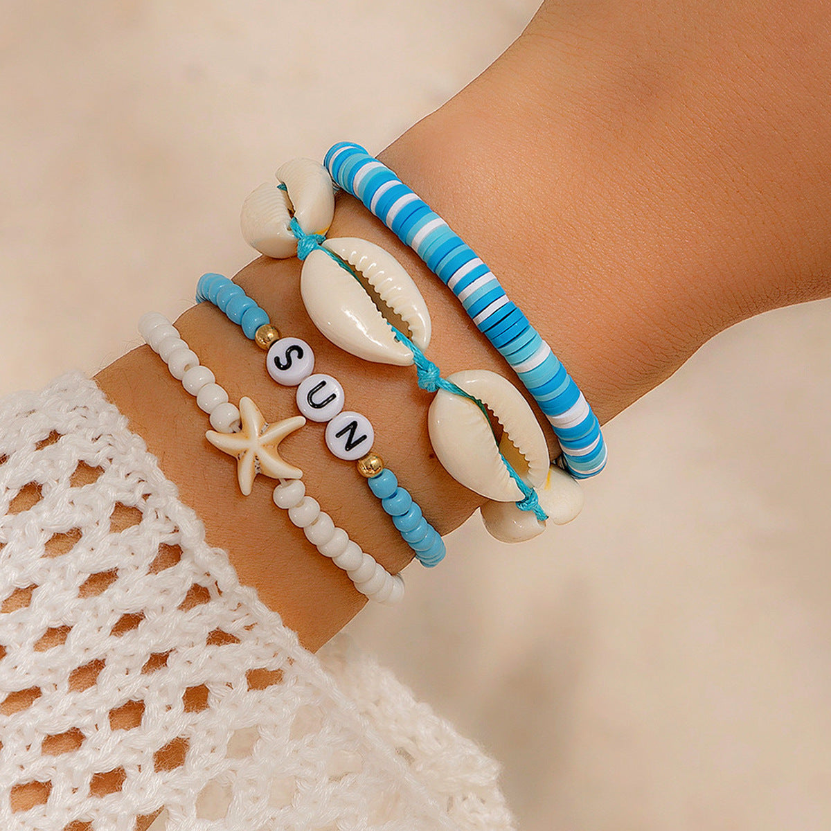 Pulsera de mujer con cuentas de estrella geométrica y conchas de estilo natural con metal chapado