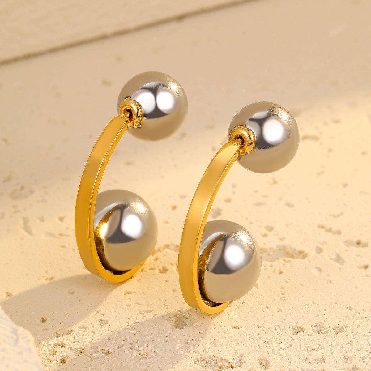Retro Style Color-Block Hollow Spherical Stainless Steel Earrings for Women with Plated Finish