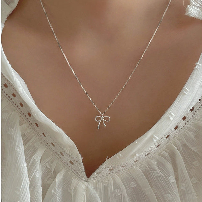 Minimalist Bow Knot Necklace in 925 Sterling Silver with Geometric Outline and Fresh Sweet Aesthetic