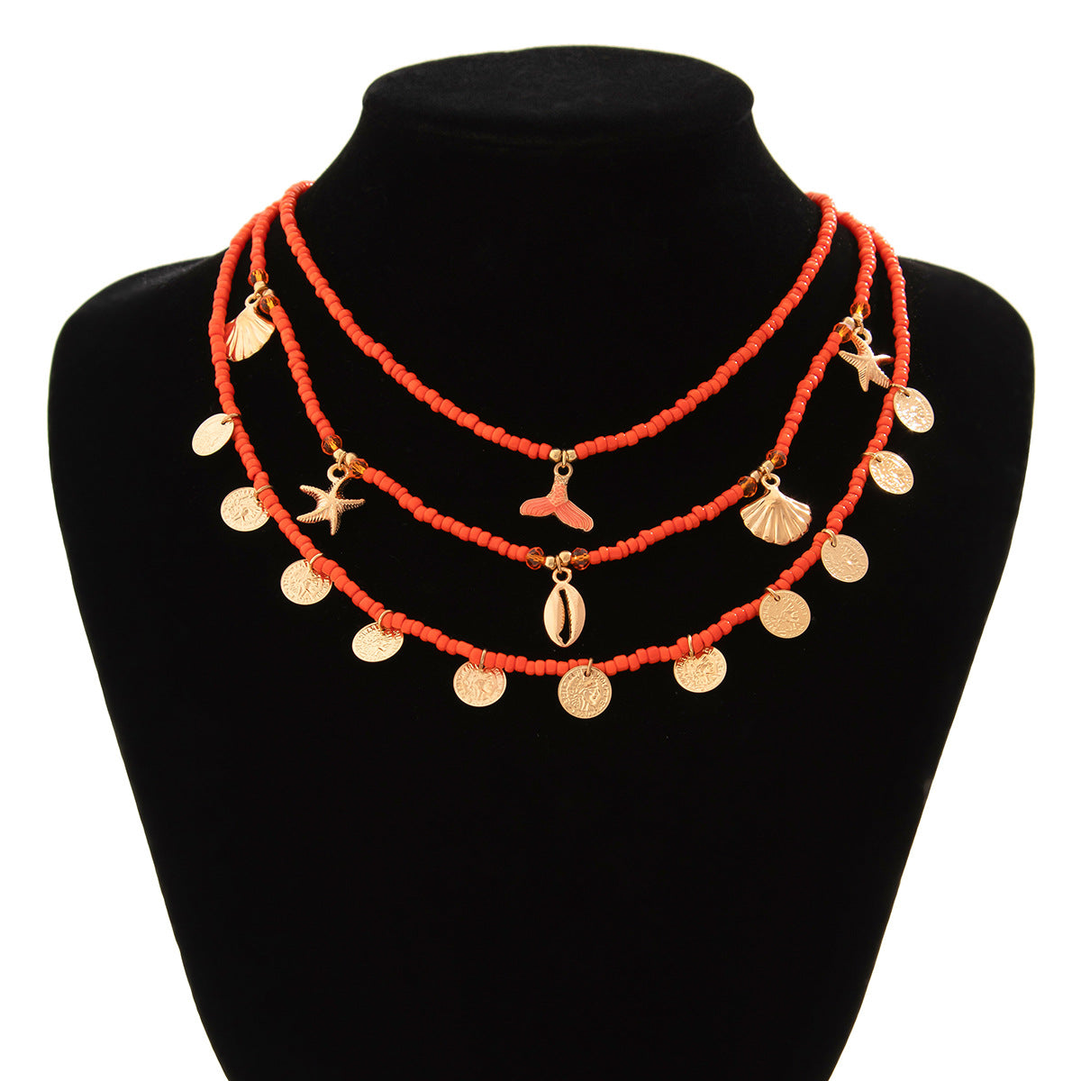 Collana con ciondolo a stella etnica e forme geometriche in lega per donna con finitura placcata, design a coda di pesce, paillettes, conchiglie, stelle marine e catena multistrato di perline