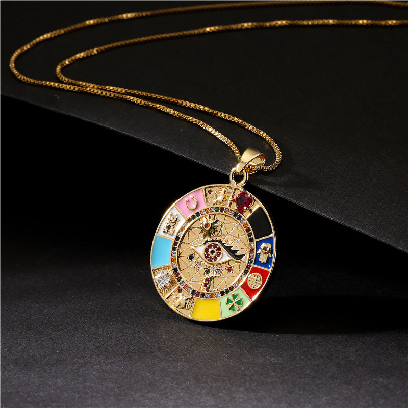 Collana pendente geometrica irregolare stile bohémien da donna con occhi in smalto e zirconi su catena a maglie in rame