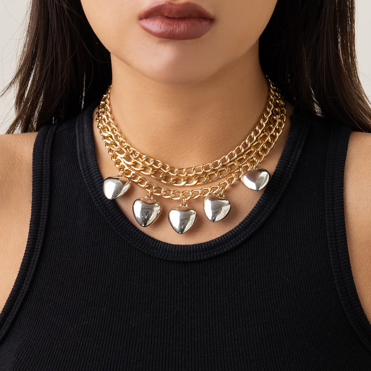 Collana con ciondolo a cuore geometrico minimalista da donna con plastica a specchio e superficie galvanizzata