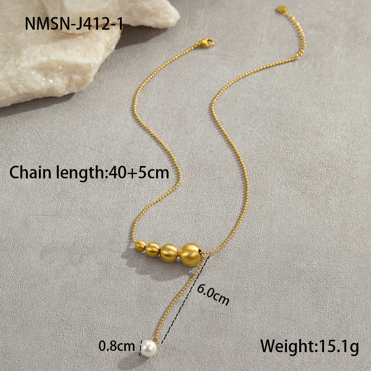 Collana da donna alla moda con perline a occhio di gatto in acciaio al titanio spazzolato con pendente geometrico placcato in oro 18 carati e delicata catena clavicolare