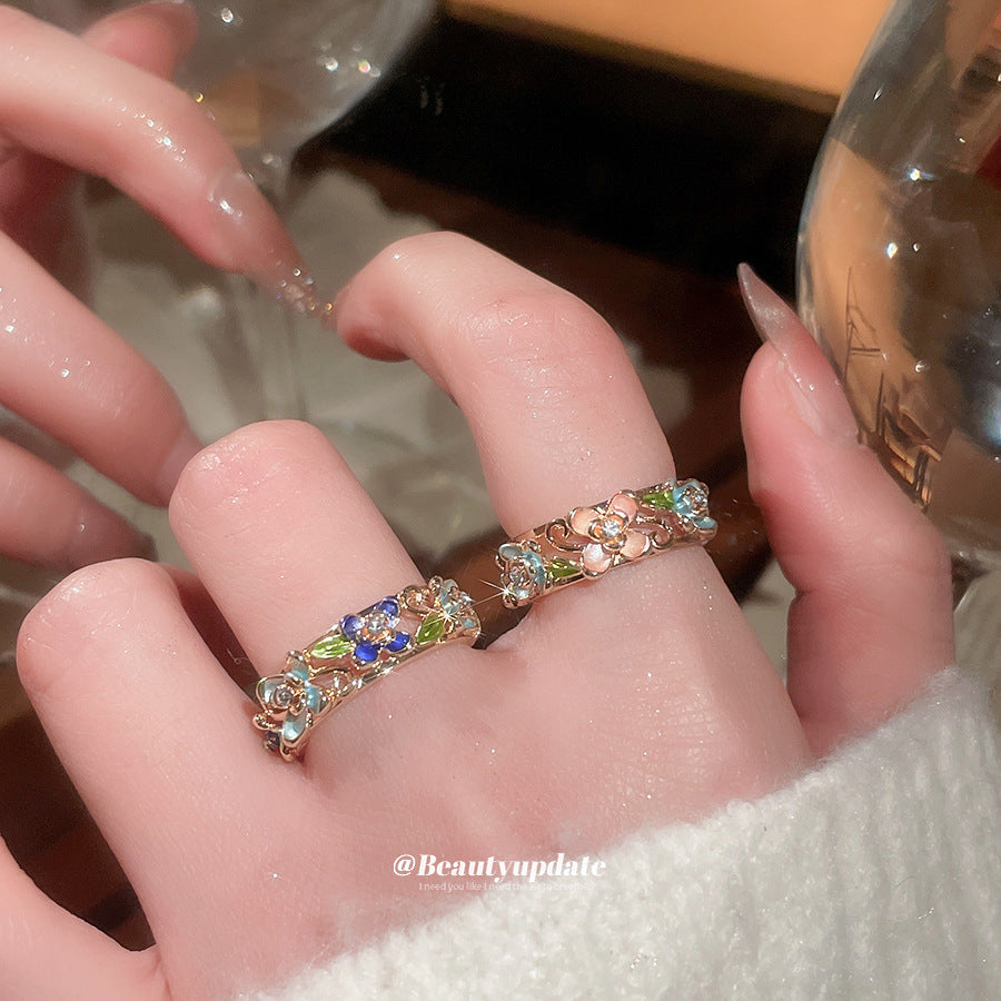 Anello floreale elegante con finitura smaltata e intarsio di strass da donna, fascia per l'indice di alta moda ispirata al vintage