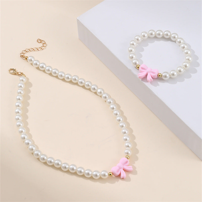 Set collana in lega a forma di fiocco stile principessa per ragazze con catena di perline rotonde e finitura artigianale