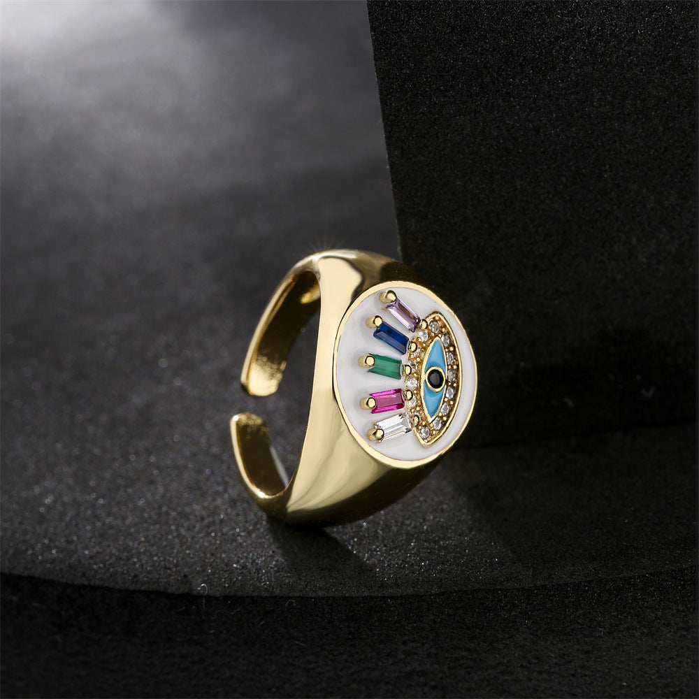 Geometric Brass Gold Plated Ring with Cubic Zirconia and Drip Oil Eye Design for Women