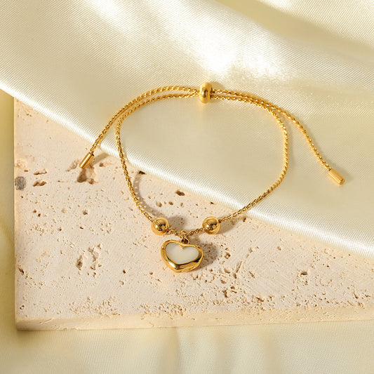 Pulsera ajustable minimalista francesa retro con diseño de corazón de abulón blanco, detalles geométricos y acero inoxidable chapado al vacío en oro de 18 quilates