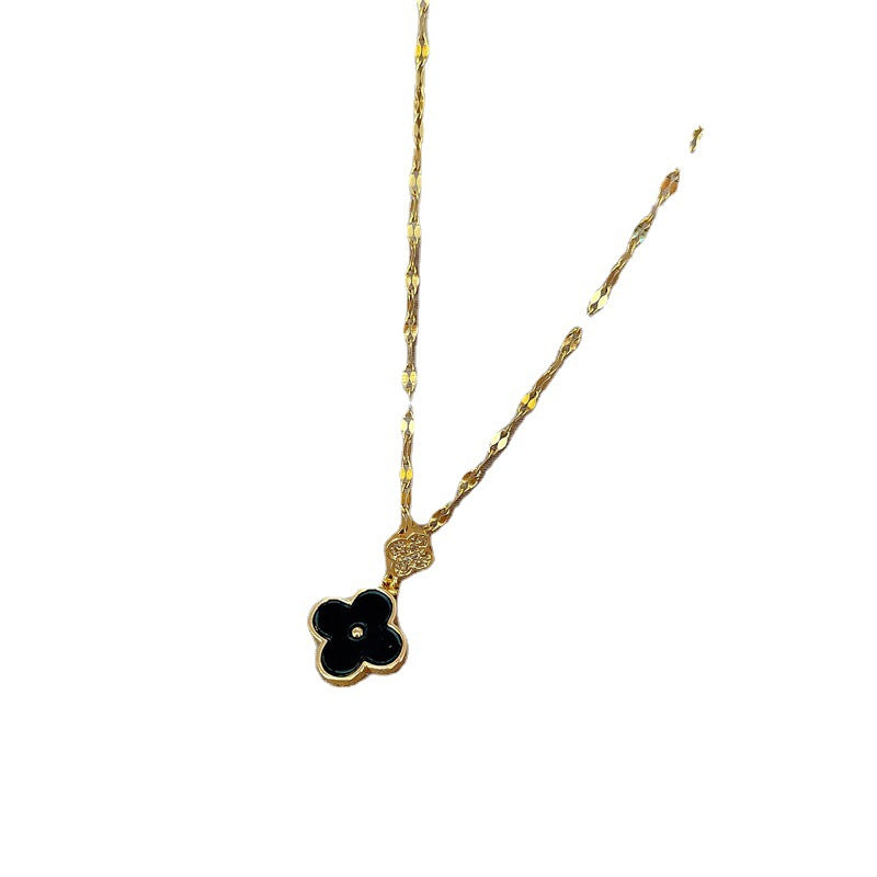 Minimalist Four-Leaf Clover Pendant Necklace in Titanium Steel with Micro-Pavé Zirconia and Fringe Detail