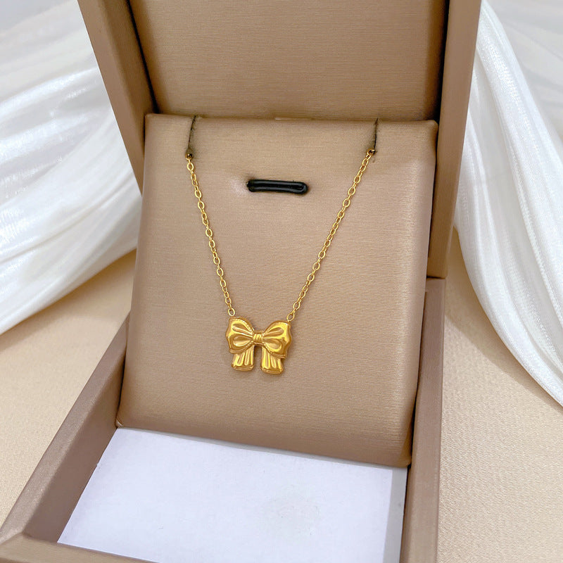 Minimalist Butterfly Knot Titanium Steel Necklace for Women with Gold Plating and Geometric Design Locket Chain