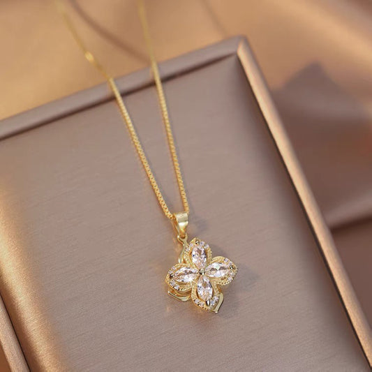 Rotatable Four-Leaf Clover Pendant Necklace with Gold-Plated Copper Charm on O-Chain in Titanium Steel for Women and Men