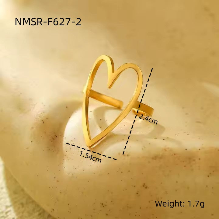 Anillo minimalista de acero de titanio en forma de corazón para mujer con diseño calado y acabado galvanizado
