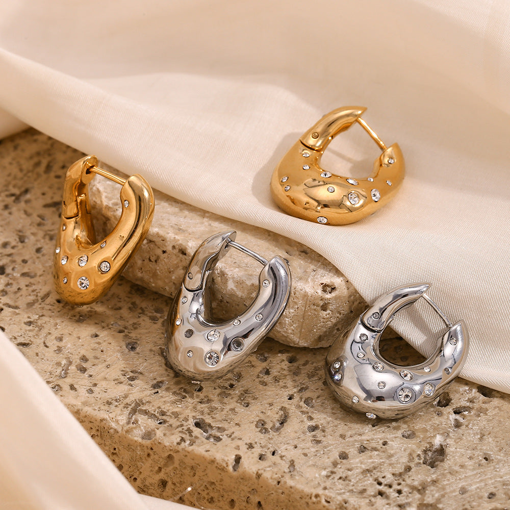 Orecchini a perno geometrici alla moda in acciaio inossidabile con placcatura in oro 18K e design a stella irregolare attorcigliata da donna