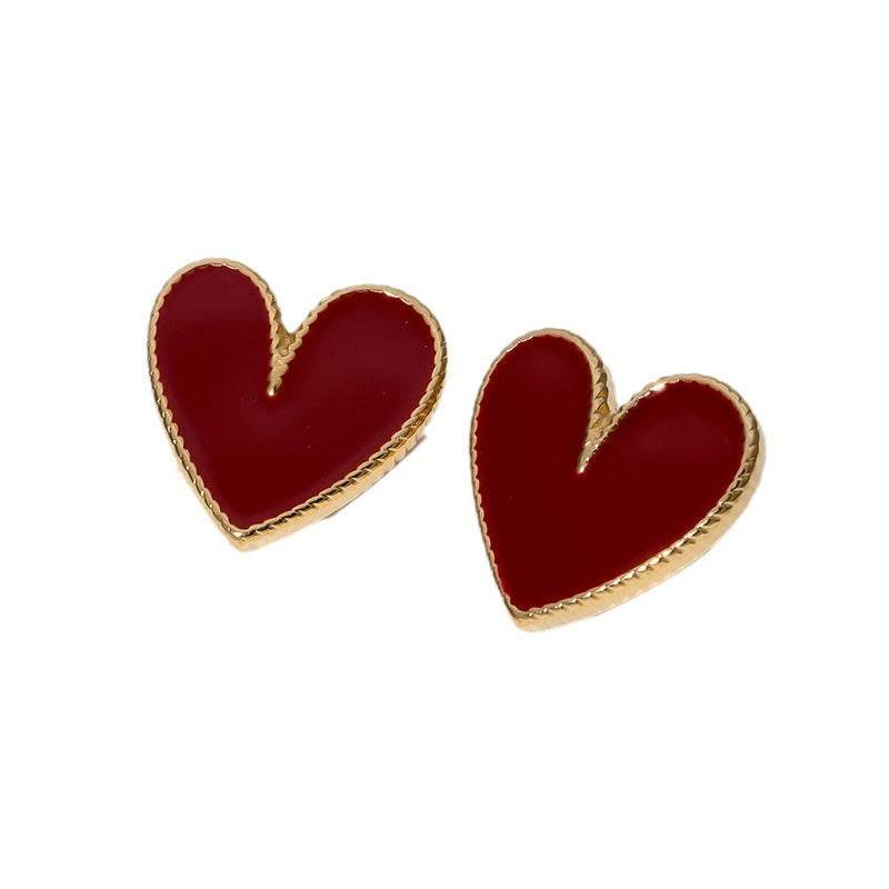 Orecchini a perno da donna in acciaio inossidabile a forma di cuore minimalista con finitura placcata