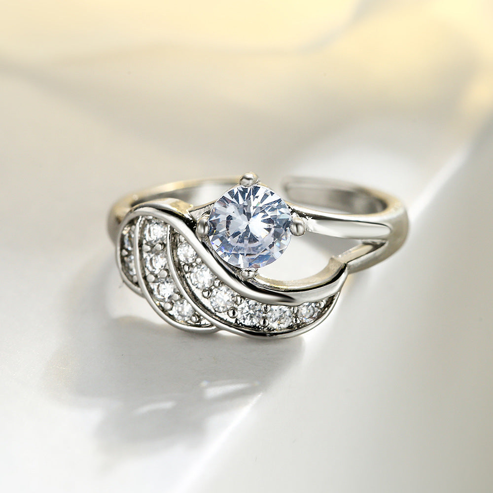 Anello da donna minimalista geometrico a forma di ala in rame con zirconia a micro-pavé