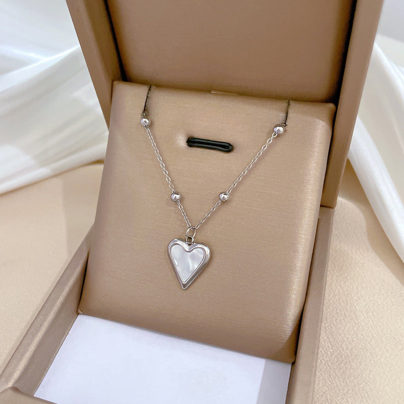 Collana con ciondolo a cuore minimalista in acciaio al titanio placcato oro per donna e uomo, stile medaglione a catena irregolare