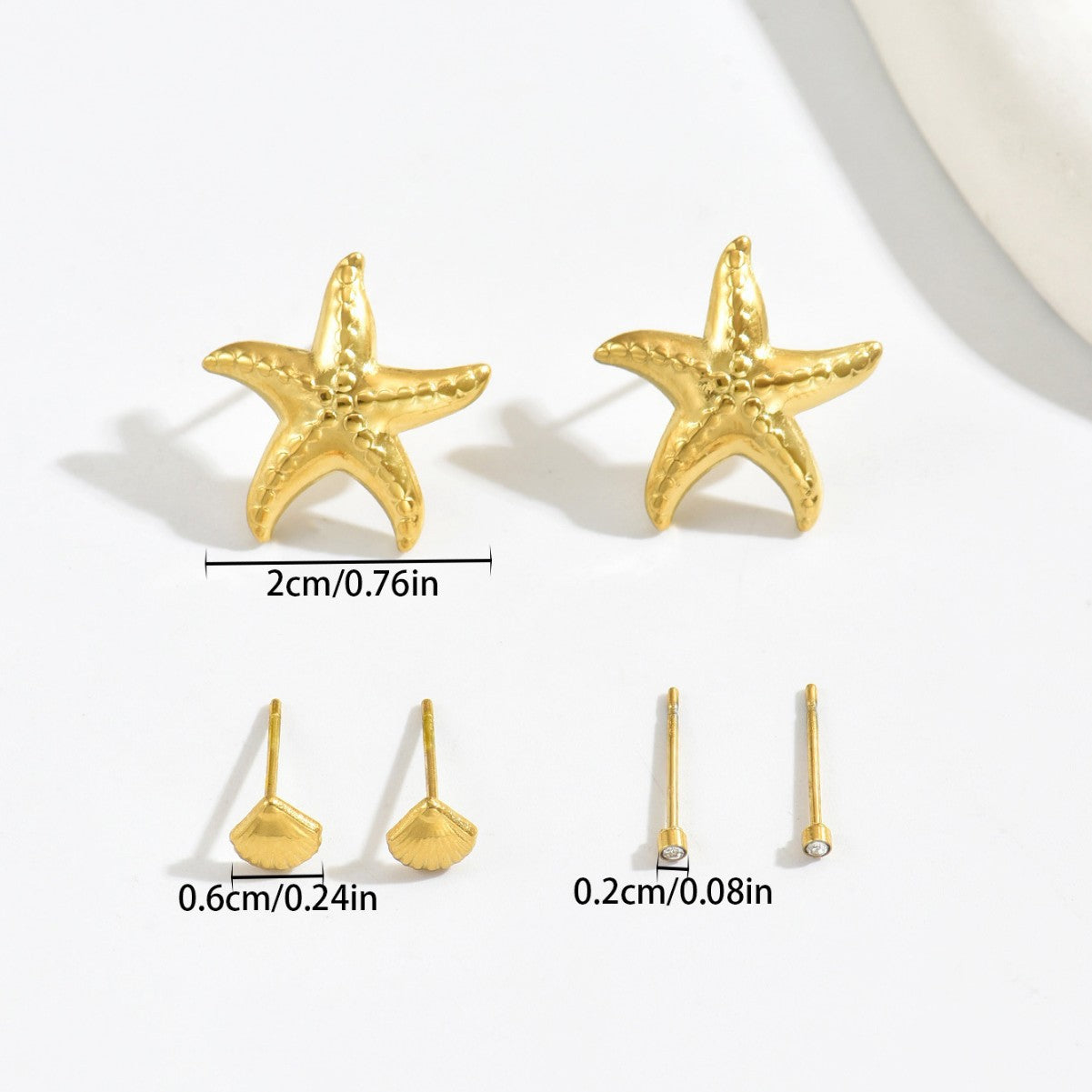 Orecchini a perno di lusso con stelle marine geometriche e conchiglie con intarsio in strass da donna