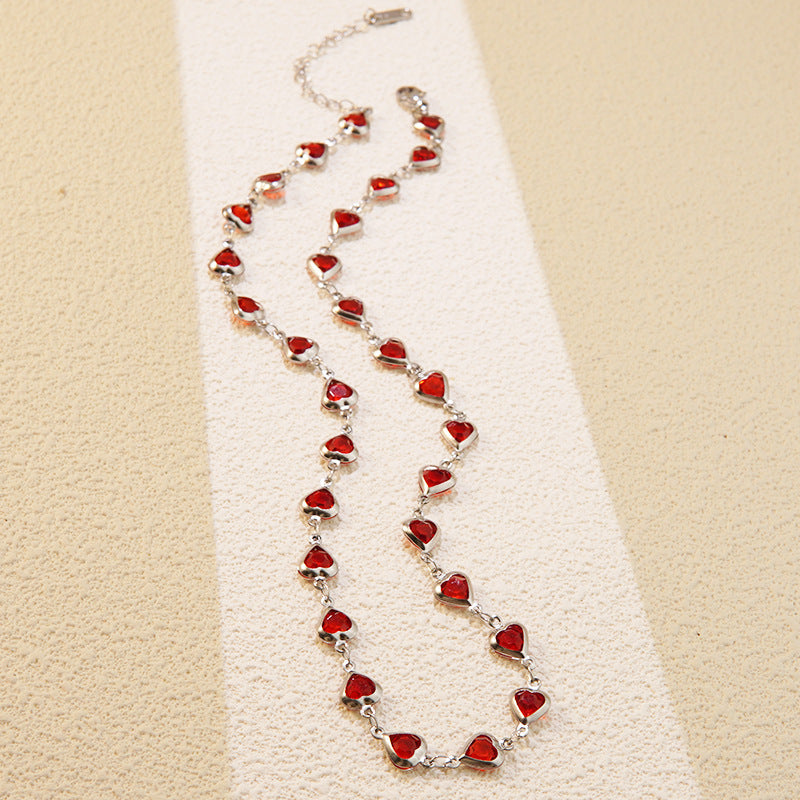 Elegante set collana e bracciale in acciaio inossidabile con zirconi cubici a cuore per donna