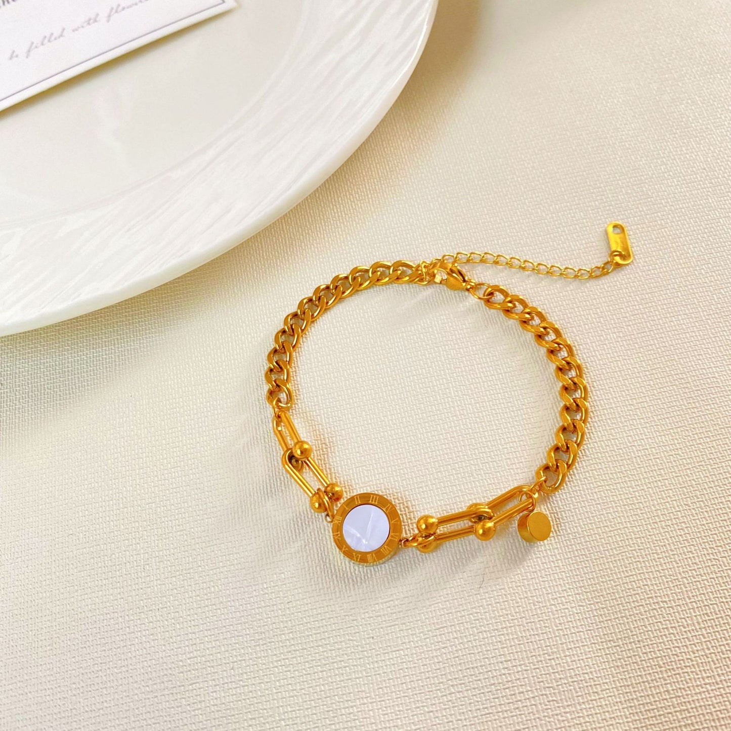 Original Design Gold Plated Titanium Steel Micro-inlaid Shell Black and White Double-sided Roman Number Bracelet
