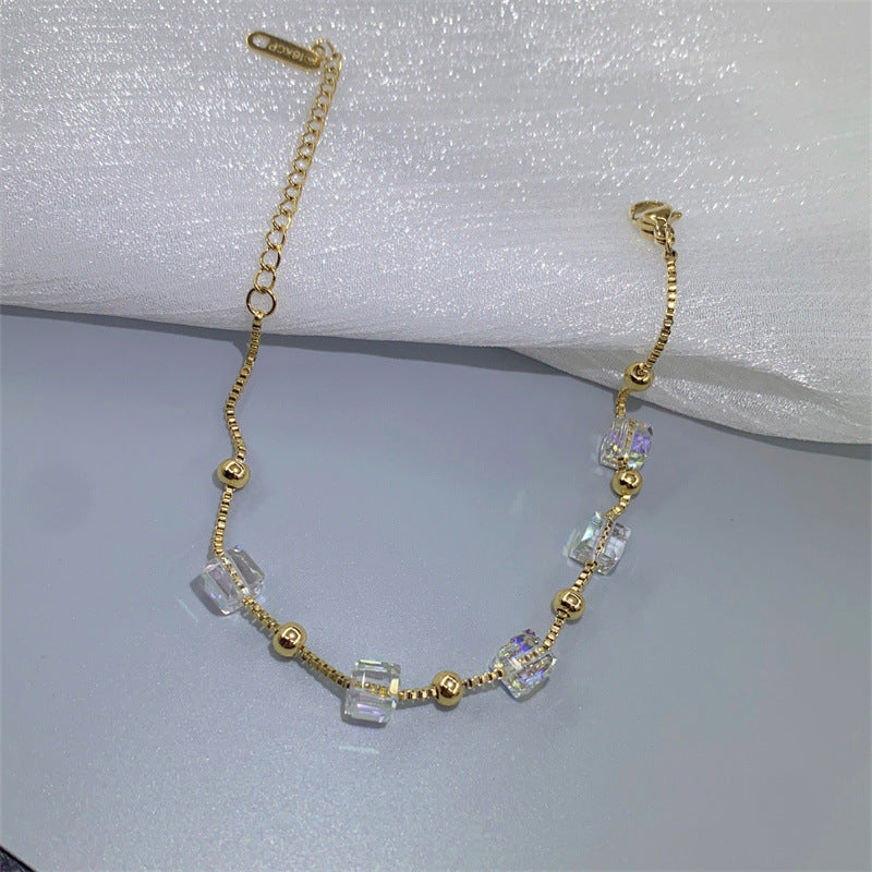 Charm Bracelet for Women with Geometric Square Design in Titanium Steel with Gold Plating and Color-Changing Crystal Accents