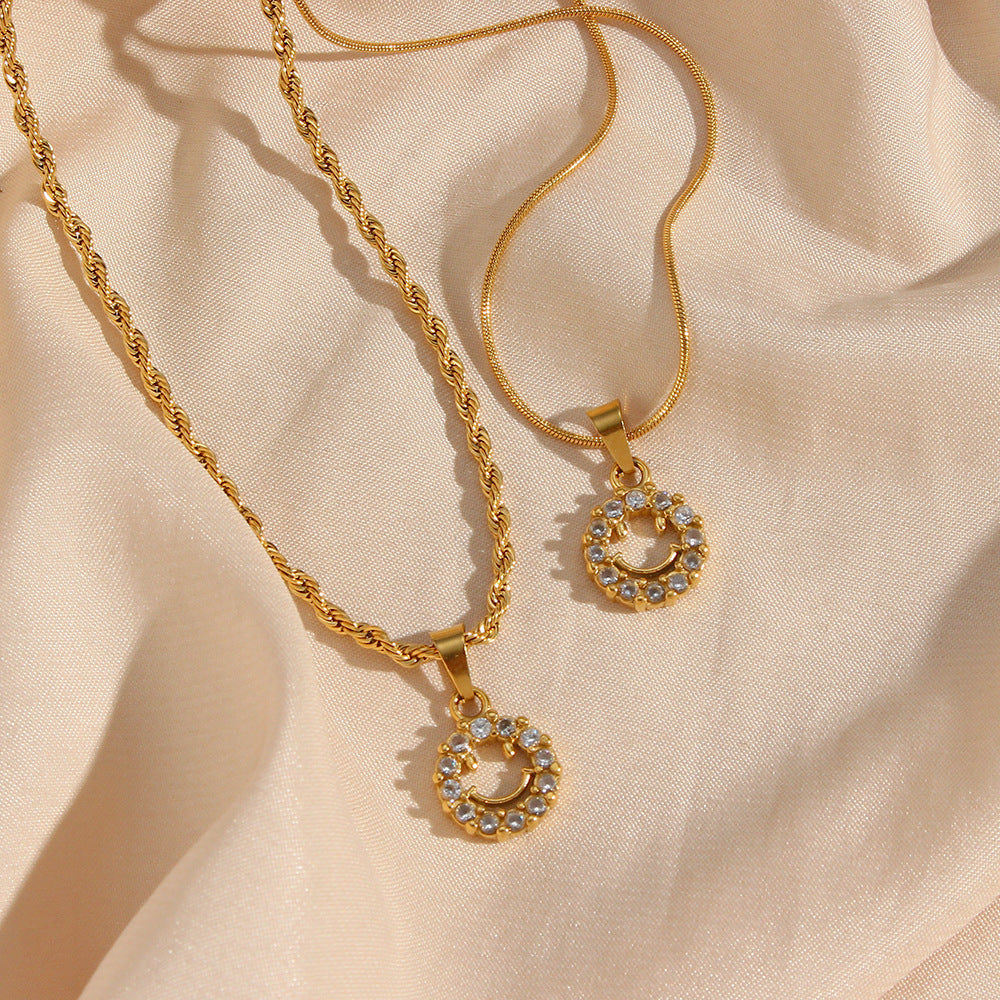 Fashionable Geometric Smile Pendant Necklace in Stainless Steel with 18K Gold Plating and Zircon Accents on Twisted Chain