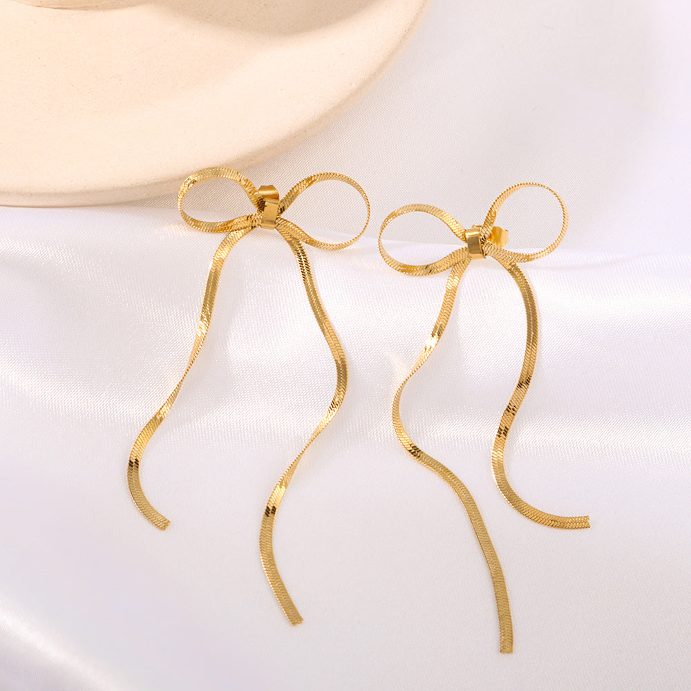 Fashion Bow-Shaped Tassel Long Earrings in Stainless Steel with 18K Gold Plated Snake Chain for Women