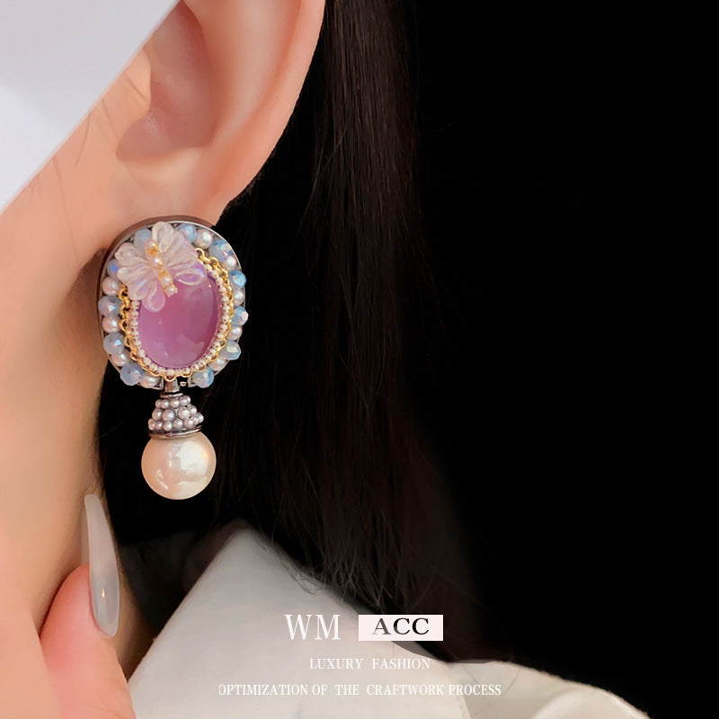 Orecchini a farfalla vintage in resina con cristalli e perle su base in lega placcata argento da donna