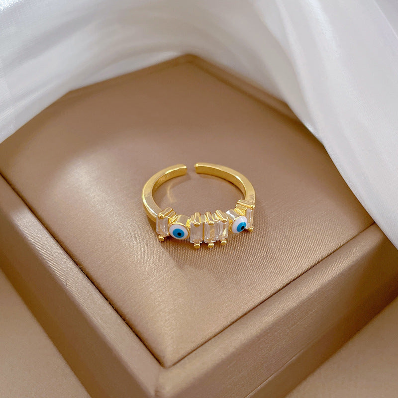 Anello Minimalista Aperto a Corona in Ottone Placcato Oro con Intarsio in Zirconi per Donna